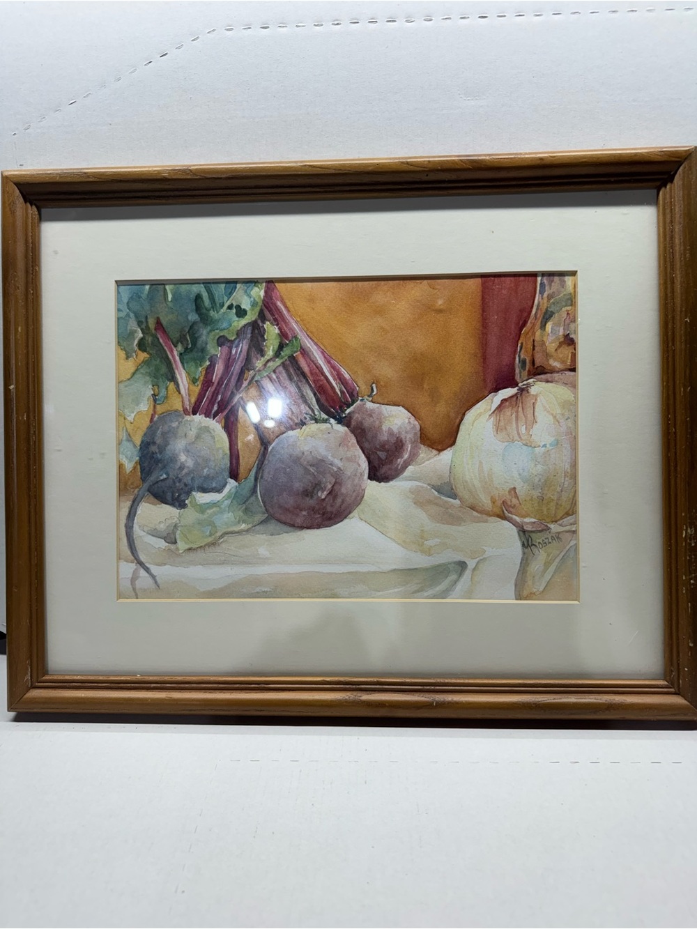 Still Life Watercolor Painting in Brown, Cream, and Purple Tones